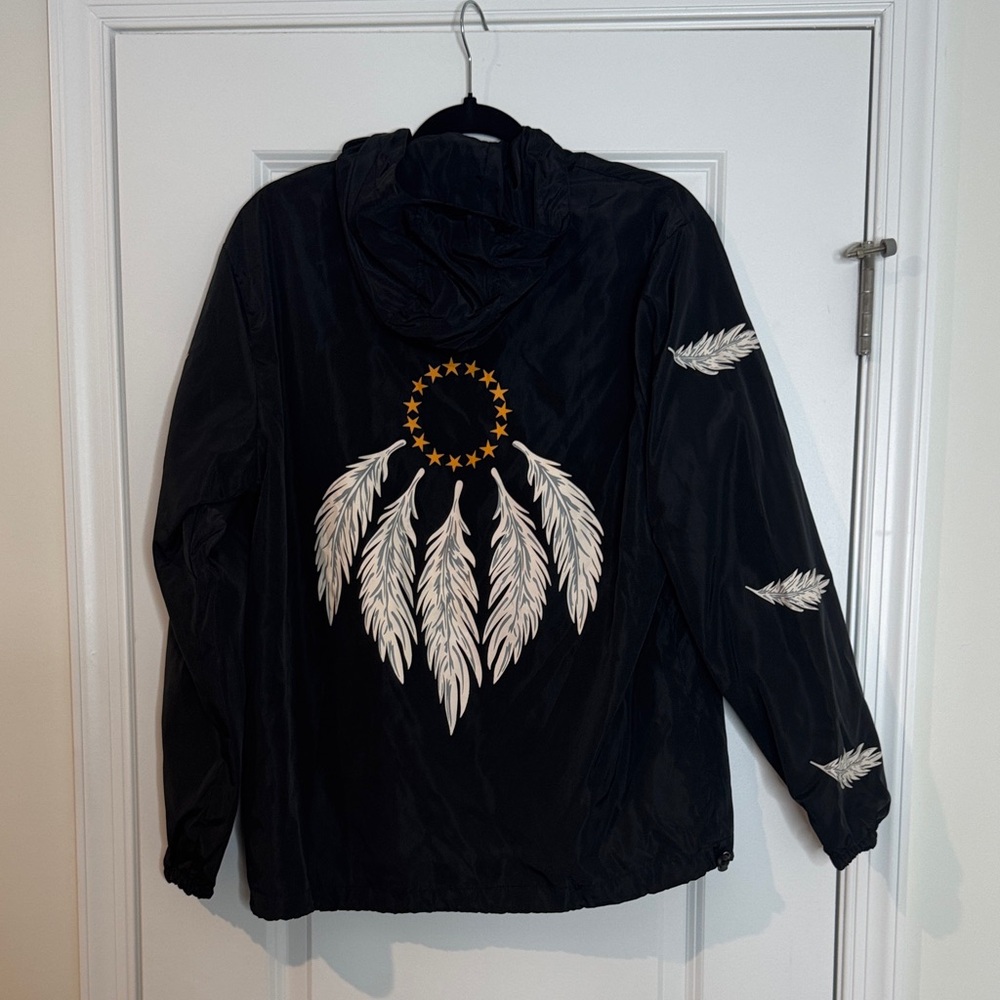 Black Jacket with Feather Accents